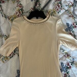 Elegant Cream Dress with Pearl Embellishments